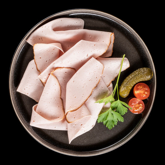 Fleischkäse geschnitten